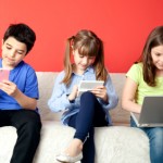 Kids using tech devices
