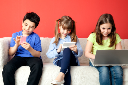 Kids using tech devices
